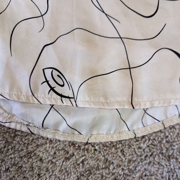 Princess Polly Satin Artsy Eye Cream and Black Mini Skirt Size 2 - Picture 8 of 14